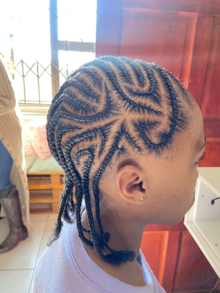 Neat cornrow braids styled at Melza Kids Hair Salon in Meadowlands