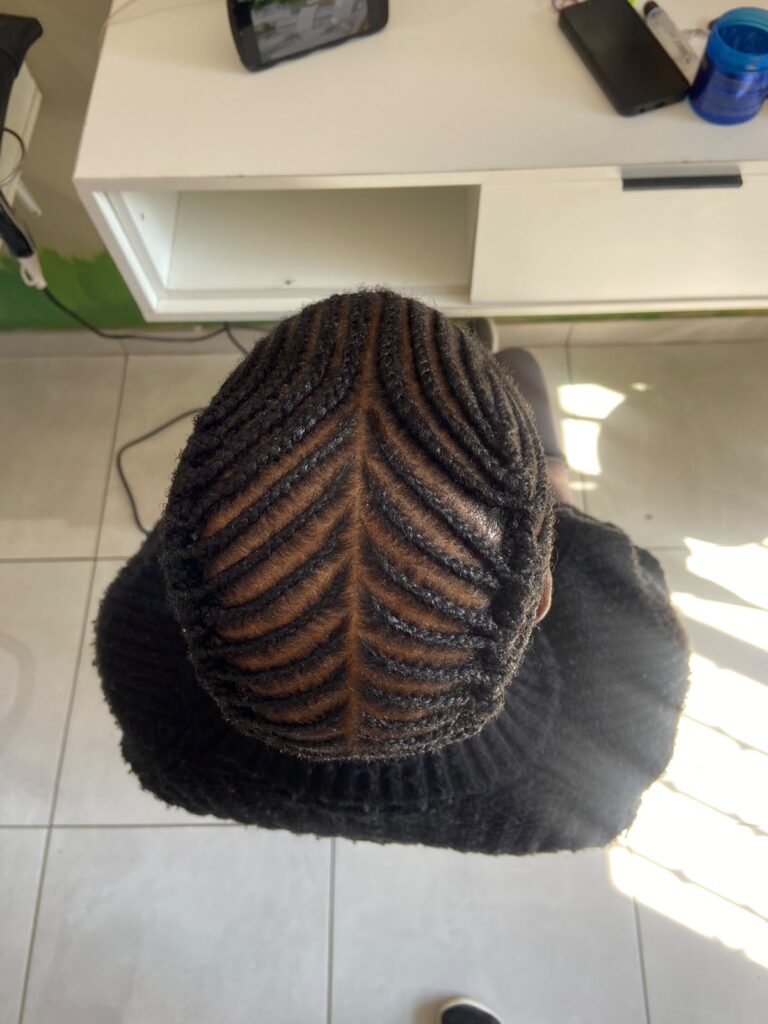 Detailed braided cornrows for kids at Melza Kids Hair Salon