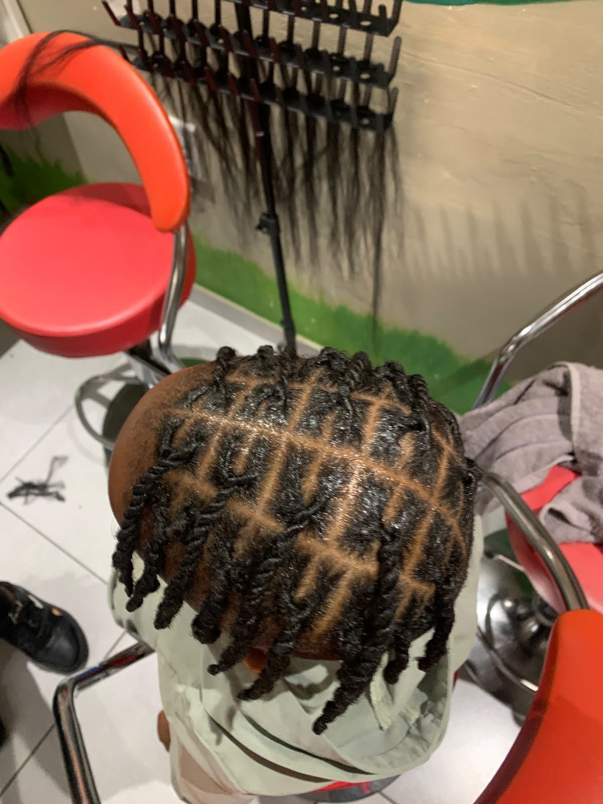 Kids hair braiding in progress at Melza Kids Hair Salon, Soweto