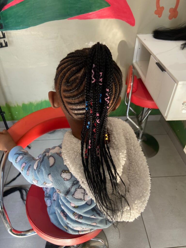 Happy child at Melza Kiddies Hair Salon, Schrader Street, Meadowlands